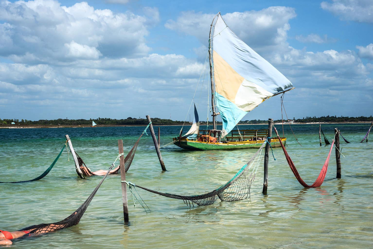 Sail boat and hammocks at the Paradise Lake (Jericoacoara Brazil)