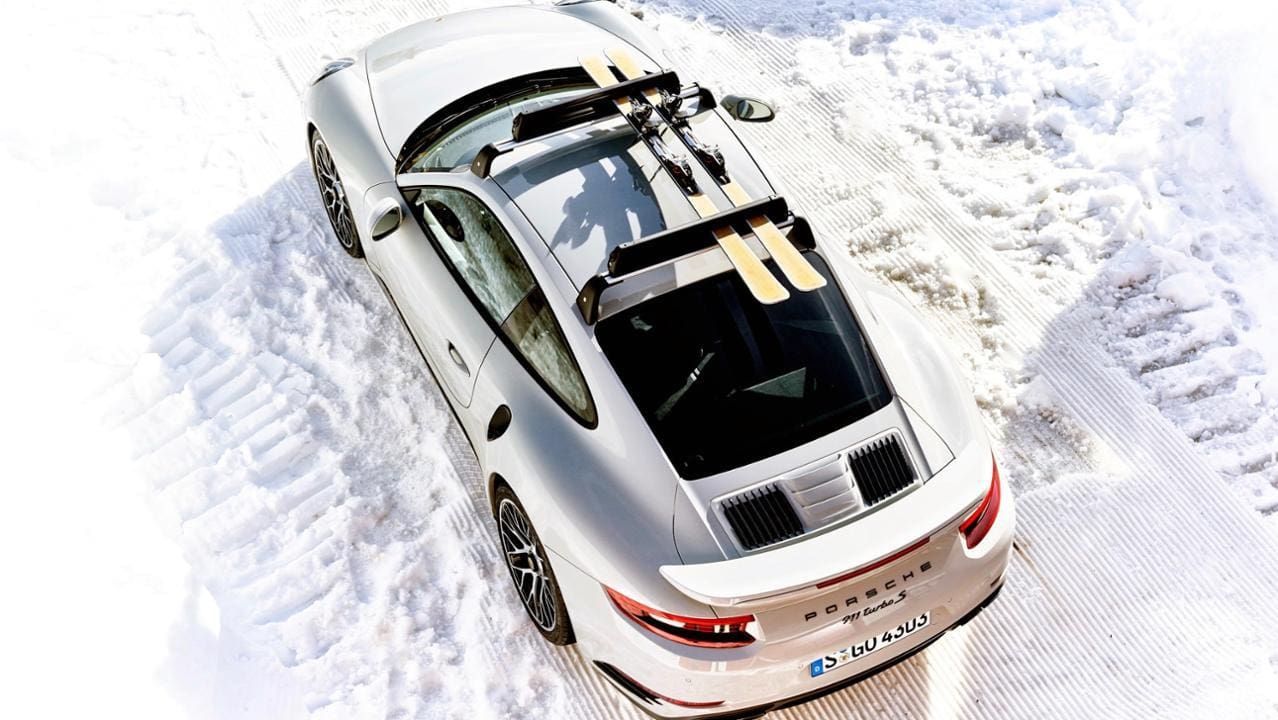 https://newsroom.porsche.com/en/sport-lifestyle/porsche-356-911-turbo-s-swiss-alps-skis-iconic-photograph-drivetribe-marcus-hoffmann-history-repeating-14817.html