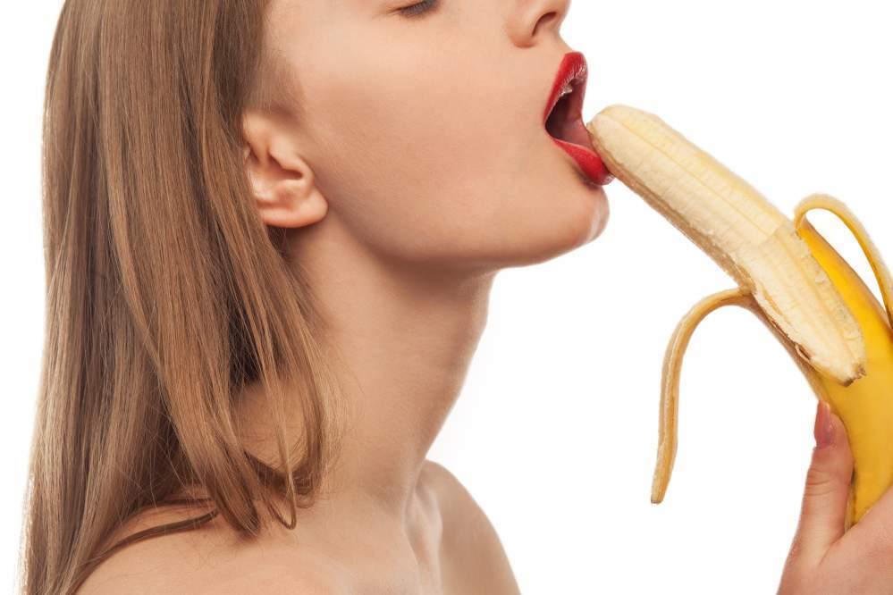 woman banana - shutterstock